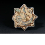 Star-shaped wall tile with dragon