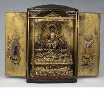 Domestic shrine (zushi) with Amida Buddha (Amida Raigō 来迎) in the royal ease pose, flanked by two kneeling boddhistava kannon and seishi; on the doors, the monks Honen and Zendō on a cloud