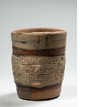 Cup-like vessel of the Kero type, with cephalomorphic decoration
