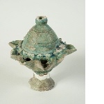 Oil lamp with nine spouts