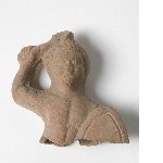 Figurine of a man with a sword and shield