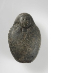 Heart-shaped amulet with a head