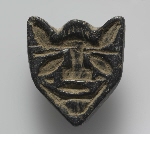 Seal-amulet in the shape of a human face (?)