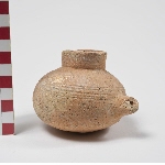 Vessel with round body and spout