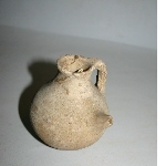 Bottle made of white-pink clay