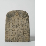 Arched stela with inscription
