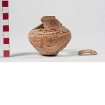 Vessel with round body and incised decoration on the shoulder