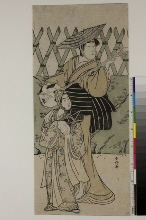 Les acteurs Nakayama Tomisaburō I dans le rôle d'un joueur de samisen itinérant et Iwai Kumesaburō dans le rôle du garçon Soga no Jūrō avec un tambour à main