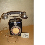 Wall telephone with rotary dial