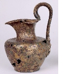 Jug with lobed mouth and rounded shoulder