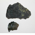 Fragments of a mirror with two bronze discs