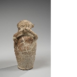 Vase in the shape of a mourner with inscription