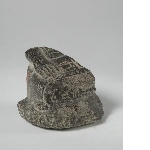 Fragment of a sitting men with inscription